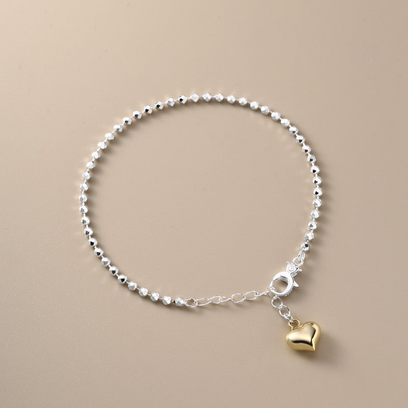 Sterling Silver Bead Strand with Gold Heart Pendant Bracelet