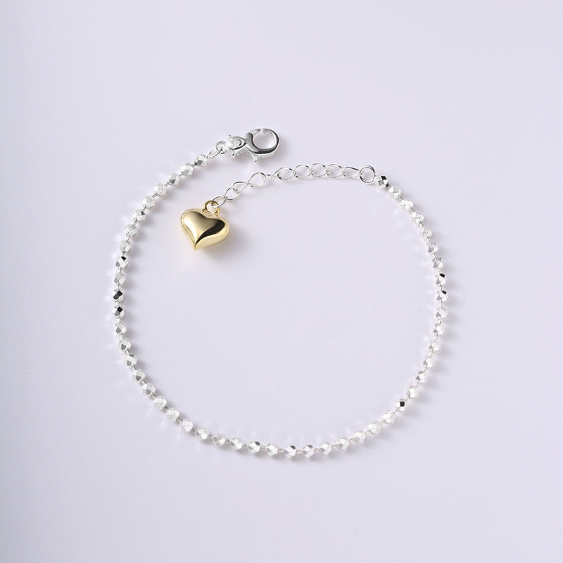 Sterling Silver Bead Strand with Gold Heart Pendant Bracelet