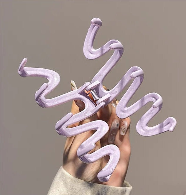 Candy-colored Wavy Hair Claw Clip made of premium acrylic, showcasing a playful wavy design in vibrant hues, approximately 10.5cm in length.