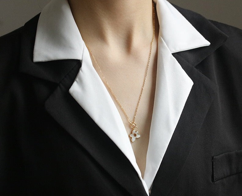 Gold-Plated Star Zirconia Earrings - Star-shaped earrings with sparkling zirconia studs.