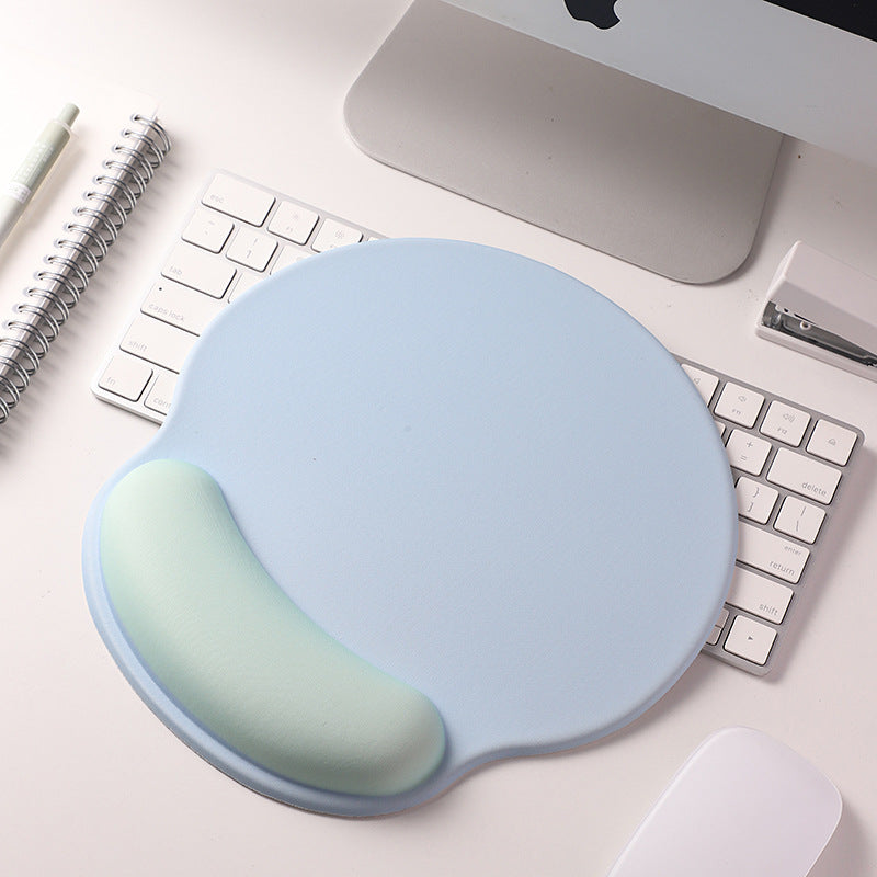 An ergonomic memory foam mouse pad with wrist support and a non-slip base, measuring 25x22 cm.
