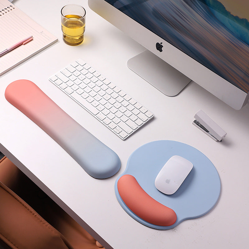 An ergonomic memory foam mouse pad with wrist support and a non-slip base, measuring 25x22 cm.