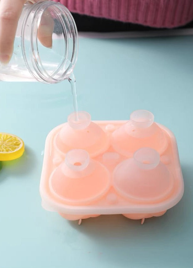 Rose-shaped ice cube mold made of silicone with four compartments, including a funnel for easy water filling