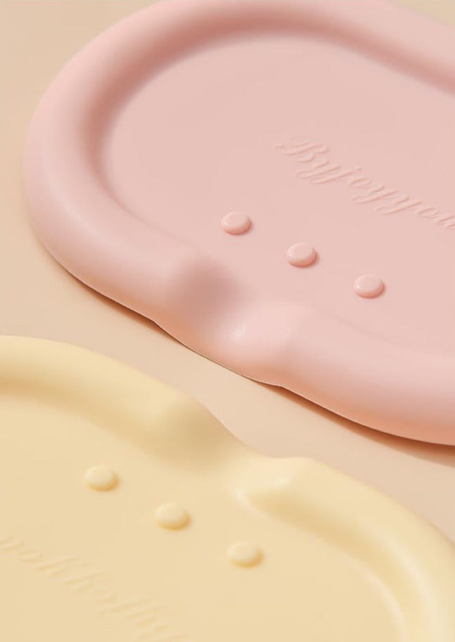 Silicone Drainage Soap Holder - A colorful and sleek soap holder made from durable silicone with a unique drainage design for proper ventilation and moisture prevention. Perfect for a stylish and functional bathroom or kitchen accessory