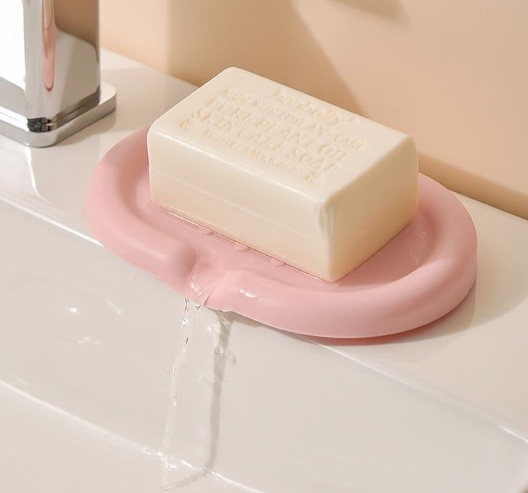 Silicone Drainage Soap Holder - A colorful and sleek soap holder made from durable silicone with a unique drainage design for proper ventilation and moisture prevention. Perfect for a stylish and functional bathroom or kitchen accessory
