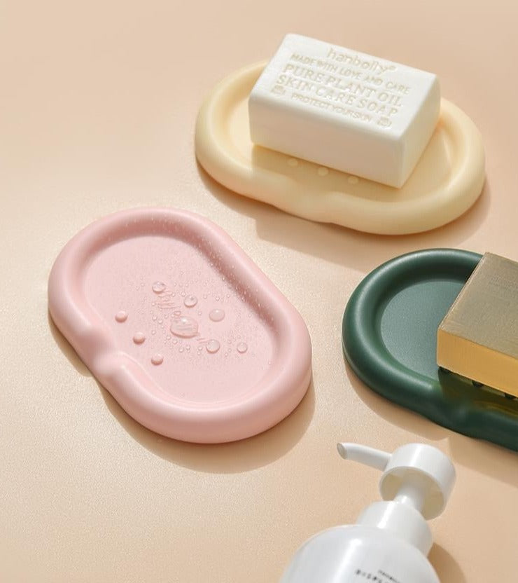 Silicone Drainage Soap Holder - A colorful and sleek soap holder made from durable silicone with a unique drainage design for proper ventilation and moisture prevention. Perfect for a stylish and functional bathroom or kitchen accessory