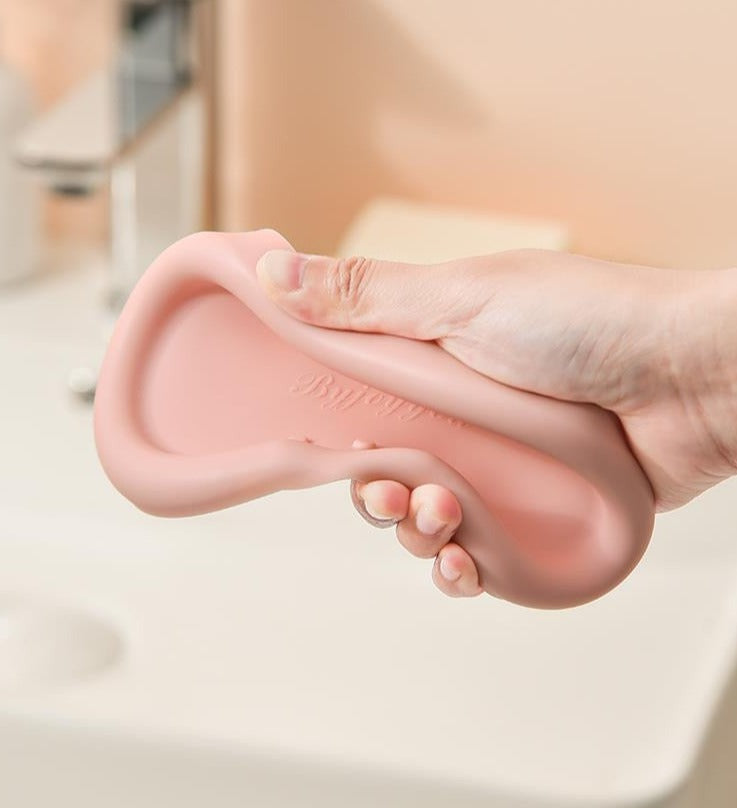 Silicone Drainage Soap Holder - A colorful and sleek soap holder made from durable silicone with a unique drainage design for proper ventilation and moisture prevention. Perfect for a stylish and functional bathroom or kitchen accessory
