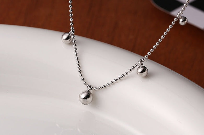 Silver Spaced Bead Necklace made of 925 sterling silver, featuring delicately spaced small round beads, with an adjustable length of approximately 40cm plus a 2cm extension.