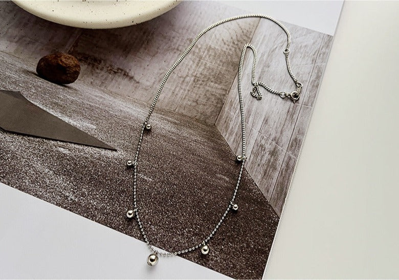 Silver Spaced Bead Necklace made of 925 sterling silver, featuring delicately spaced small round beads, with an adjustable length of approximately 40cm plus a 2cm extension.
