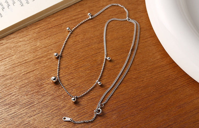Silver Spaced Bead Necklace made of 925 sterling silver, featuring delicately spaced small round beads, with an adjustable length of approximately 40cm plus a 2cm extension.