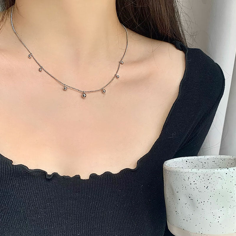Silver Spaced Bead Necklace made of 925 sterling silver, featuring delicately spaced small round beads, with an adjustable length of approximately 40cm plus a 2cm extension.