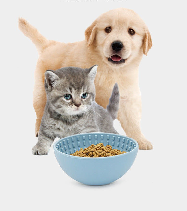 Wobbler Slow Feeder Bowl made of food-grade silicone, featuring a unique wobbling design and a textured licking pad for improved oral health, in a size of 16.5cm x 8cm with a capacity of 880ml.