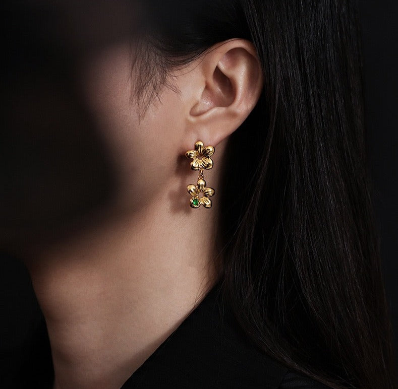 Zirconia Flower Chain Earrings in gold and silver, featuring delicate flower accents on a dual-chain design