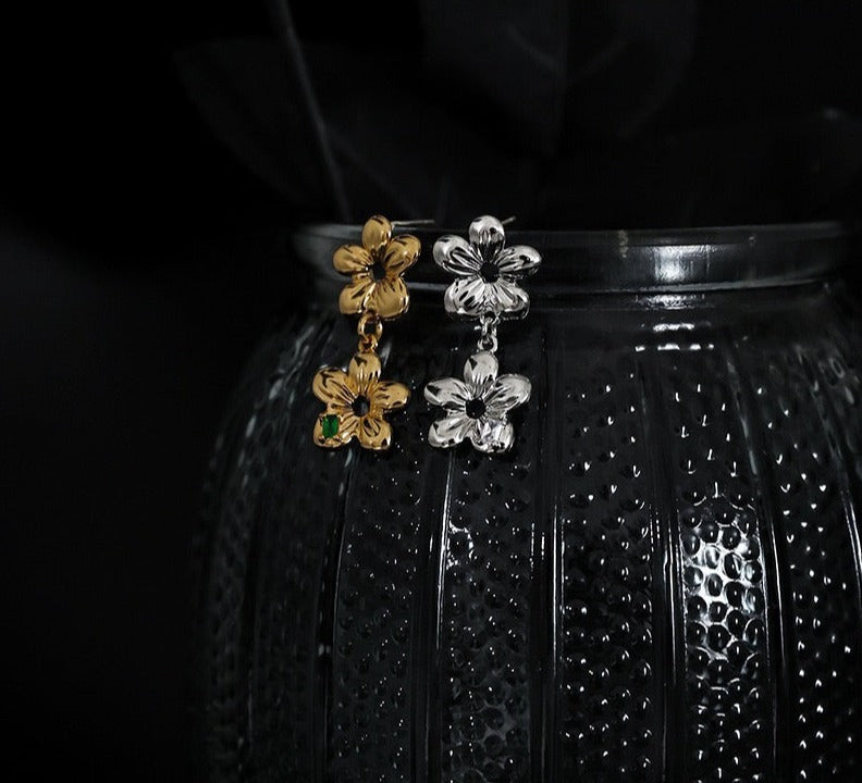 Zirconia Flower Chain Earrings in gold and silver, featuring delicate flower accents on a dual-chain design