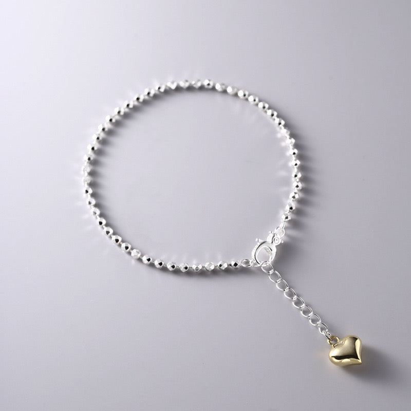 Sterling Silver Bead Strand with Gold Heart Pendant Bracelet