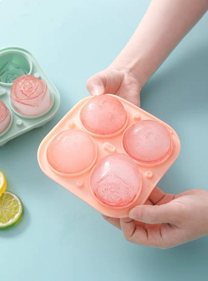 Rose-shaped ice cube mold made of silicone with four compartments, including a funnel for easy water filling