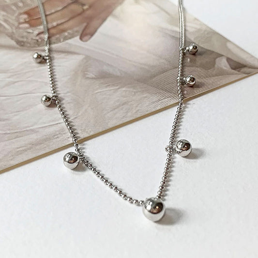 Silver Spaced Bead Necklace made of 925 sterling silver, featuring delicately spaced small round beads, with an adjustable length of approximately 40cm plus a 2cm extension.