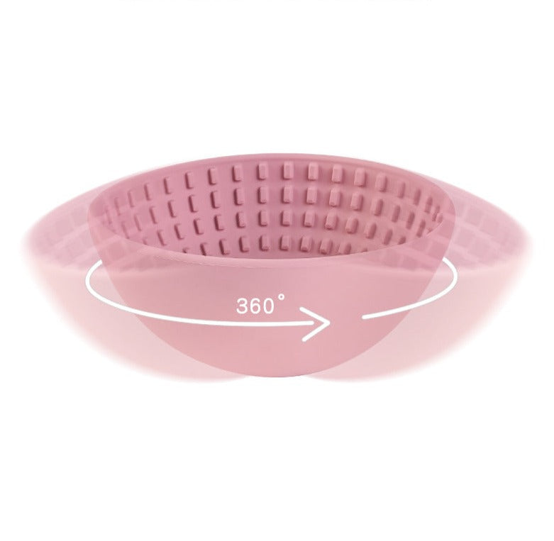 Wobbler Slow Feeder Bowl made of food-grade silicone, featuring a unique wobbling design and a textured licking pad for improved oral health, in a size of 16.5cm x 8cm with a capacity of 880ml.